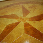 custom-star-logo-decorative-acid-stained-concrete custom-star-logo-decorative-acid-stained-concrete