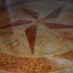 custom-star-logo-decorative-stained-concrete Concrete Staining with Star Decorative Engraving