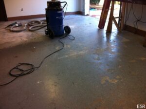 DIY disaster epoxy flooring being removed